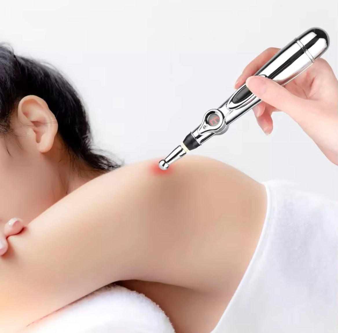 Acu Pen shown against a shoulder