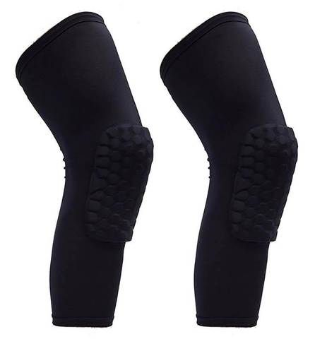 Pair of black padded knee sleeves with protective knee panels on a white background