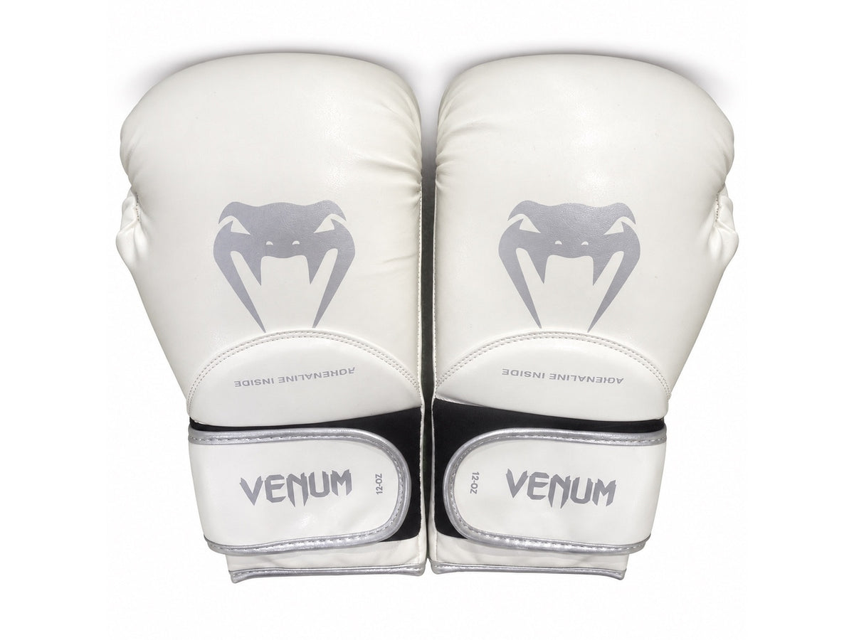 White Venum boxing gloves